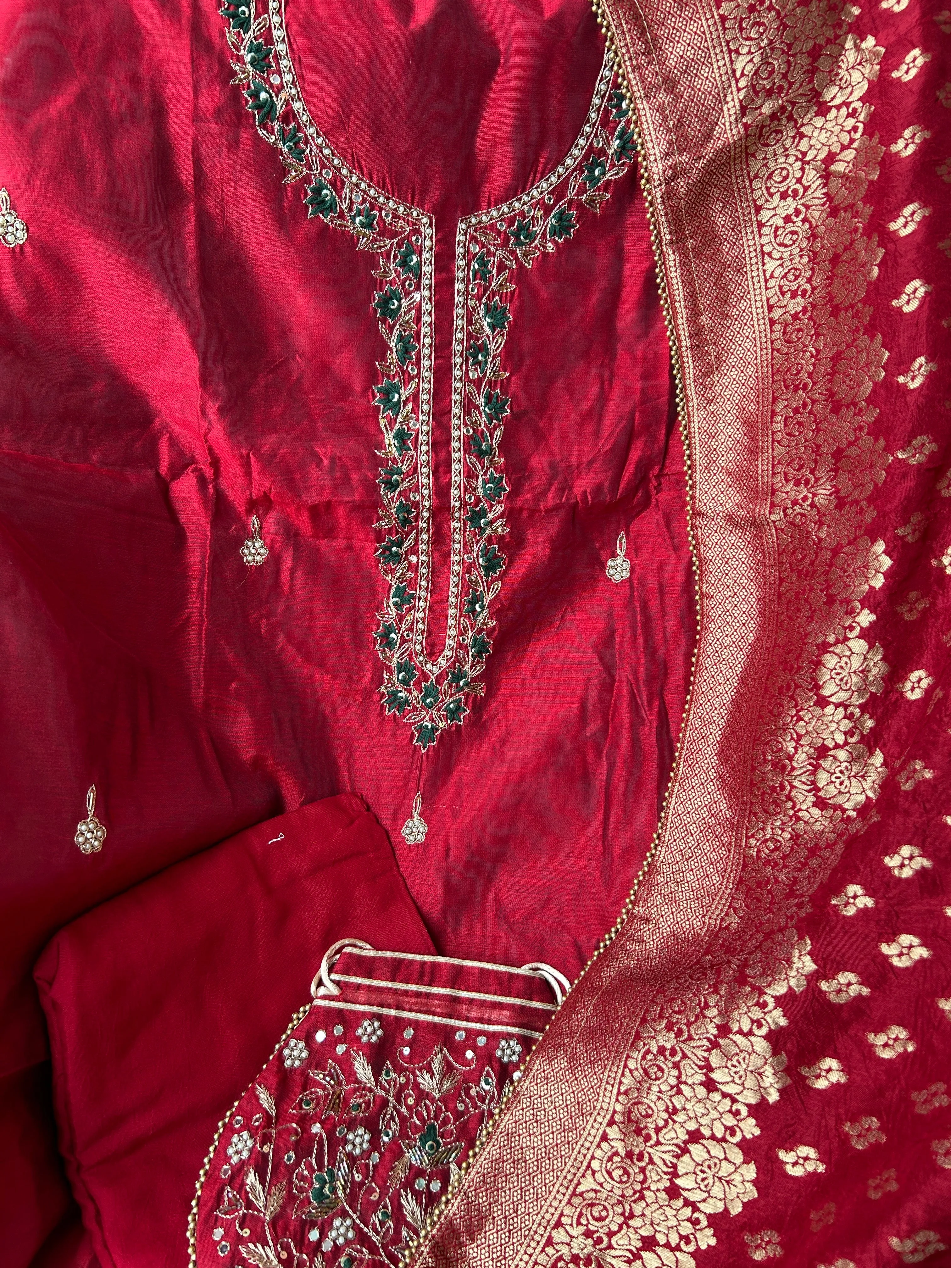 Red Party Wear Dress Material with matching Potli