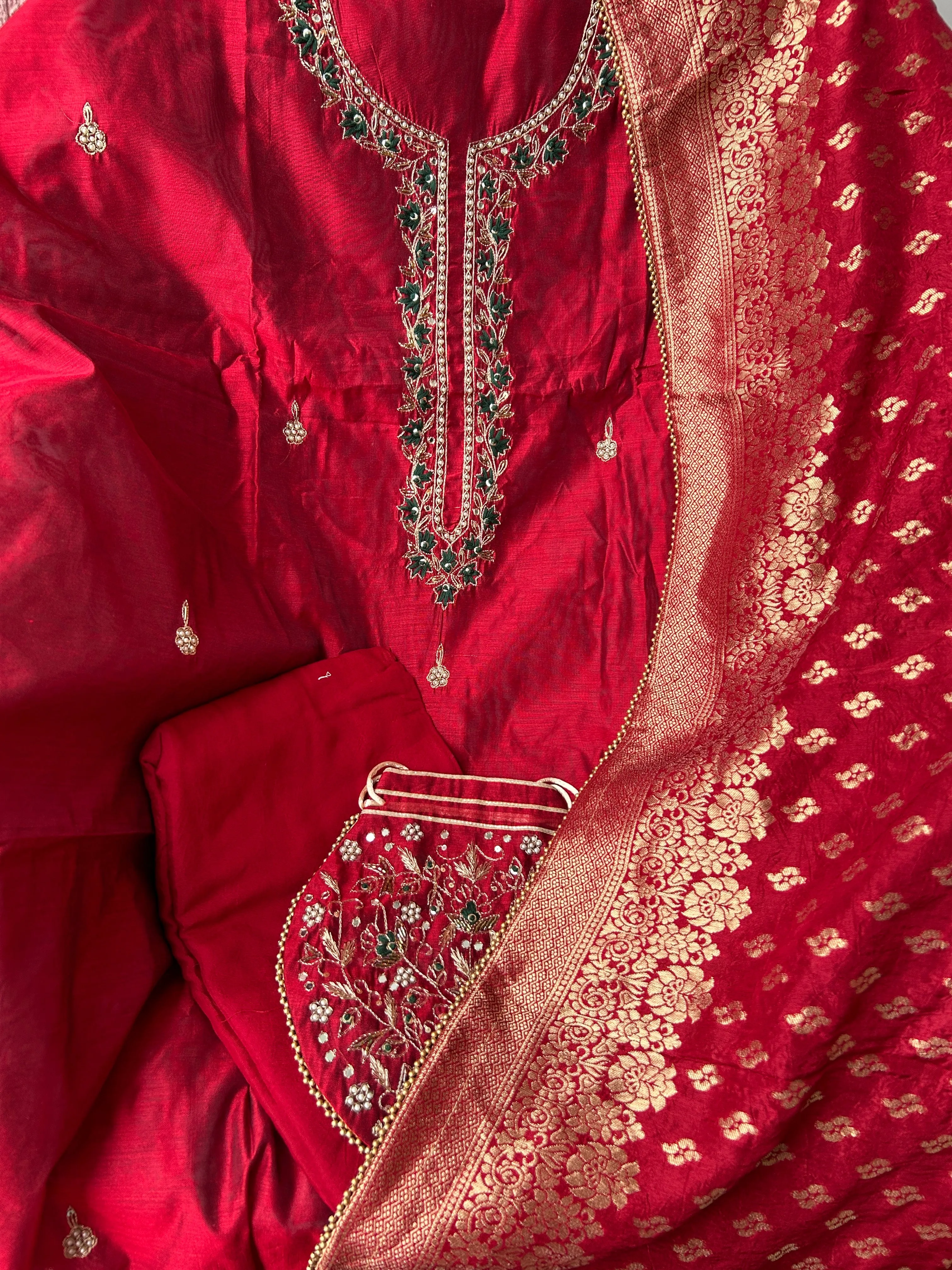Red Party Wear Dress Material with matching Potli