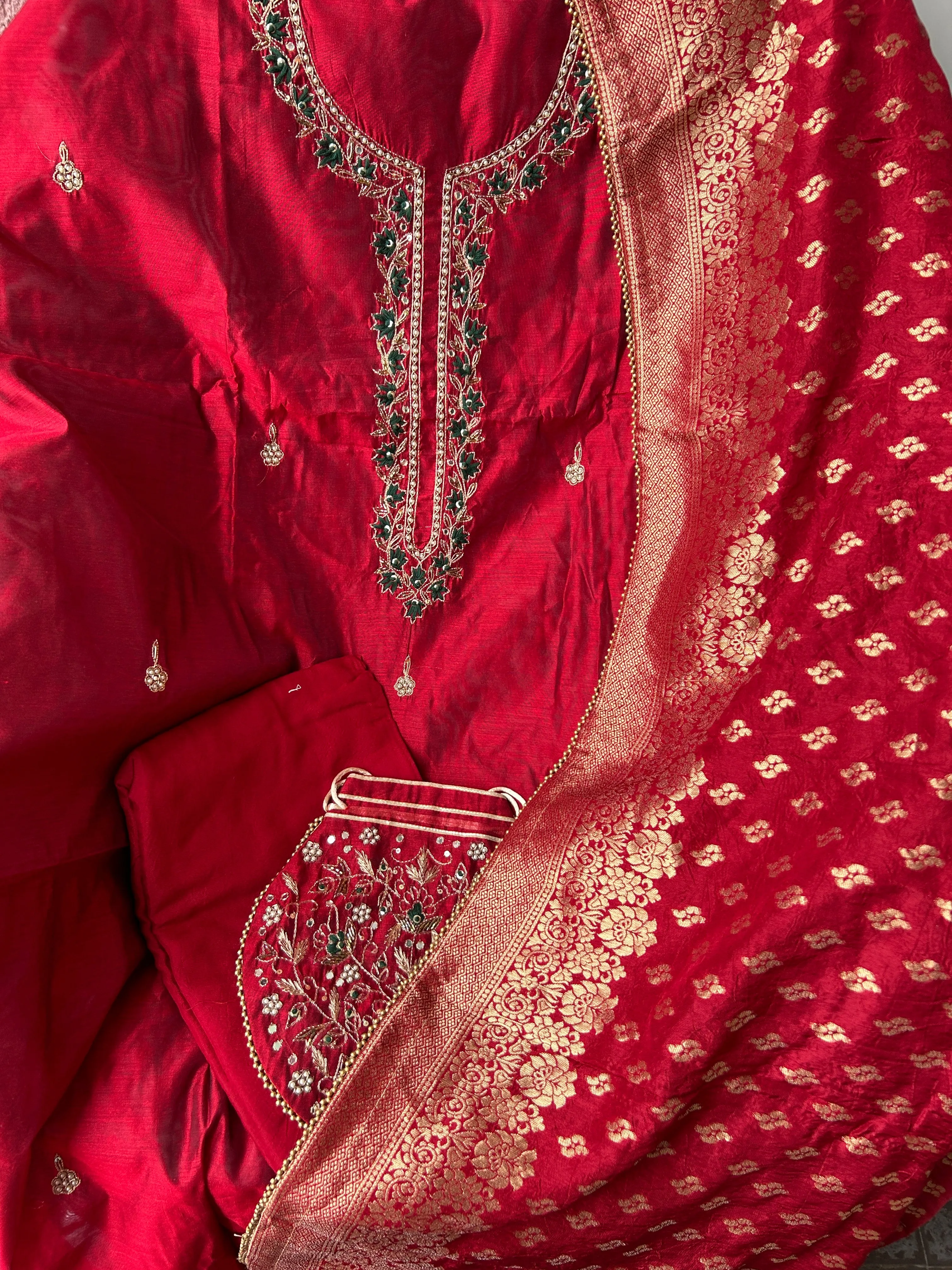 Red Party Wear Dress Material with matching Potli