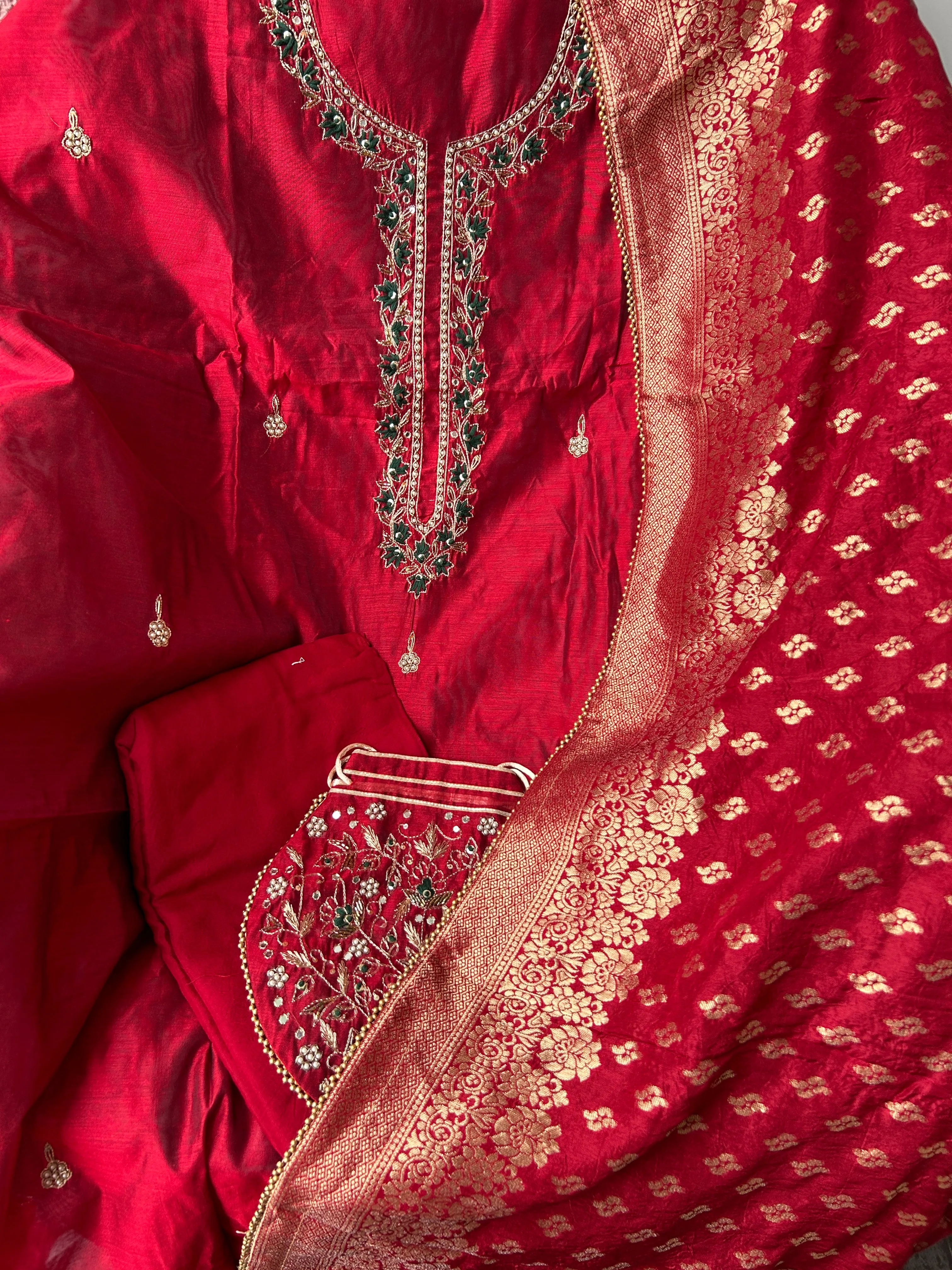 Red Party Wear Dress Material with matching Potli